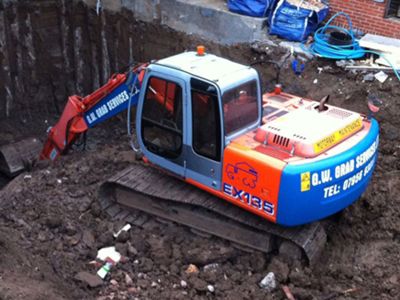 Mini digger excavating
